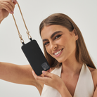 Crossbodyphonecase.PhonecasewithLanyard.Smartphonestrap.Phone-purse.Phonechainpearls.PearlPhoneBracelet.Wristlet.BandolierStyle.Casetify.Carrie-Case.Thedailyedited.Mimco.Luxuryphon