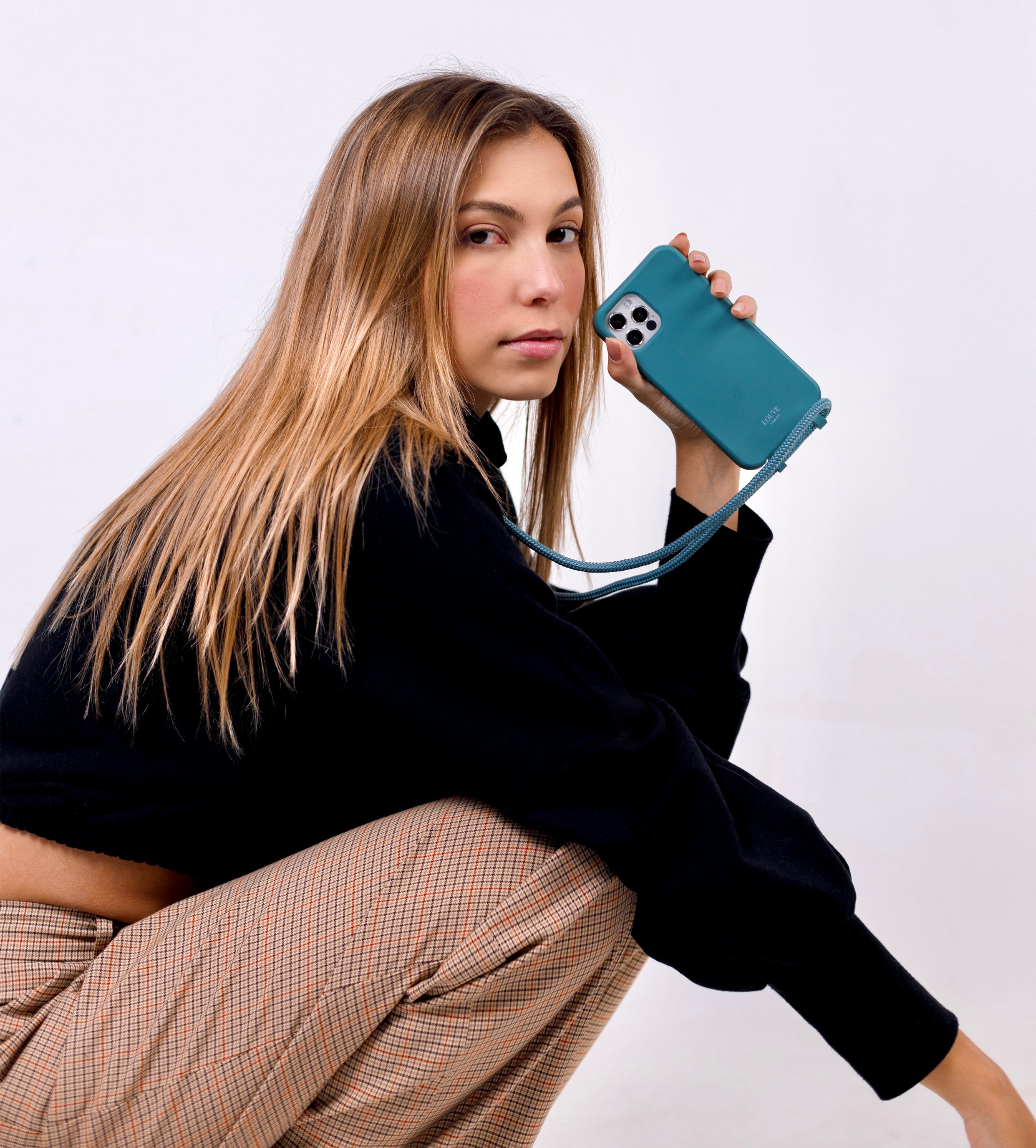 Hands-free phone case. Phone case with strap. Xouxou. Phone chain with pearls. Clear phone case. Custom smartphone accessories. Phone case with Pearl cord. Chain for your phone. Phone Strap with pearls. Phone Bracelet. Phone Necklace. wristlet. wristband. phone Charm. phone Charms. iPhone 13 pro max. mini. crossbody phone case. Phone harness. Lanyard. iPhone mini phone bag. Bandolier. Casetify. personalise your phone. TDE. modular.