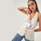 Crossbody smartphone case. iPhone accessory. Phone case with strap. Phone Harness. Lanyard. Phone-bag. Pearl Phone chain. Phone-Bracelet. Wristlet. Maison de sabre. Bandolier Style. Ideal of Sweden. Carrie-Case. The daily edited. Mimco. Luxury iphone case.