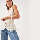 Crossbody phone case. Phone case with pearl strap. Emily in Paris. Ashley Park. Mindy. Pearly phone chain. Phone chain with pearls. Clear phone case. Custom smartphone accessories. Phone case with Pearl wristlet. pearl Chain for your phone. Phone lanyard with pearls. Double phone cord with pearls. Pearl phone bracelet. wristlet. wristband. phone Charm. phone Charms. phone Wristlets. modular phone case. iPhone straps. 13 pro max. mini. Lanyard. iPhone cords. mini phone bag. phone-necklace. Phone purse.