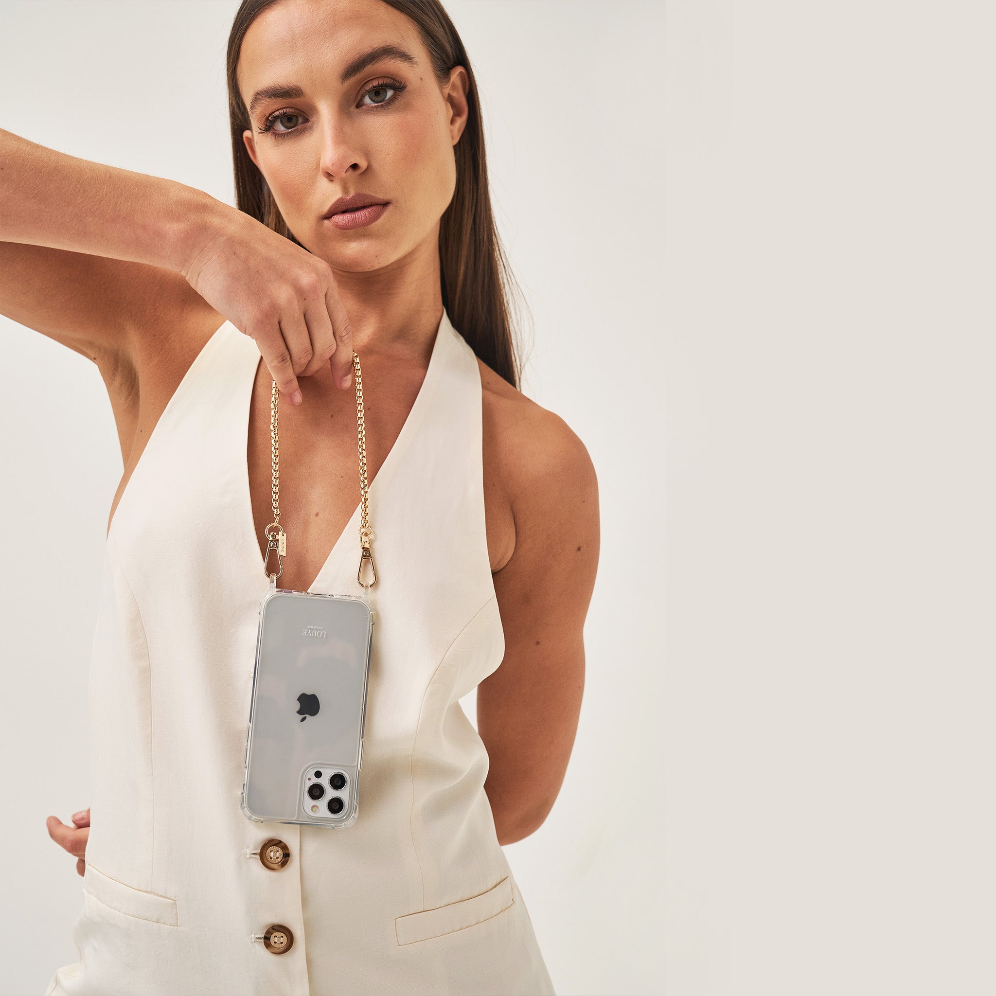 Crossbody smartphone case. iPhone accessory. Phone case with strap. Phone Harness. Lanyard. Phone-bag. Pearl Phone chain. Phone-Bracelet. Wristlet. Maison de sabre. Bandolier Style. Ideal of Sweden. Carrie-Case. The daily edited. Mimco. Luxury iphone case.