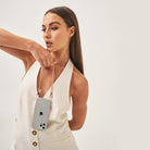 Crossbody smartphone case. iPhone accessory. Phone case with strap. Phone Harness. Lanyard. Phone-bag. Pearl Phone chain. Phone-Bracelet. Wristlet. Maison de sabre. Bandolier Style. Ideal of Sweden. Carrie-Case. The daily edited. Mimco. Luxury iphone case.